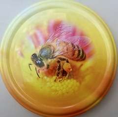 Nakrętka fi82/6 żółto-różowa z pszczółką - opakowanie 50 szt.