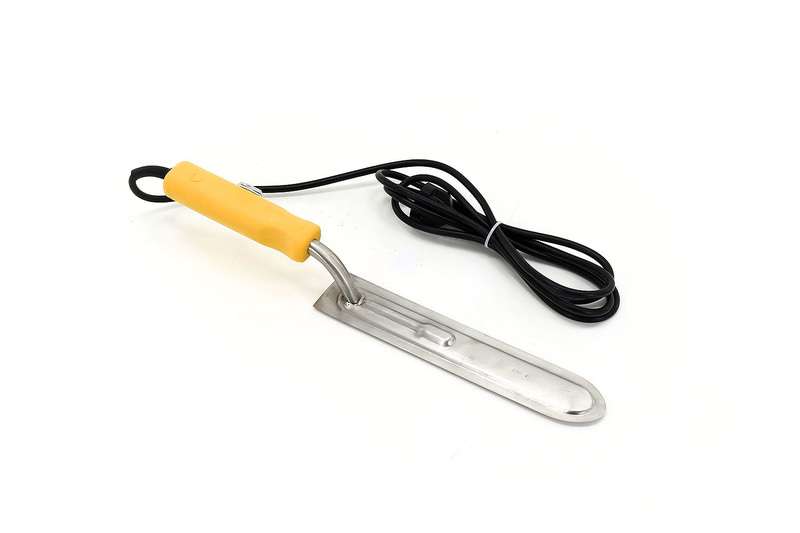 Nóż elektryczny do odsklepiania z włącznikiem przy uchwycie