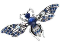 Broszka ozdobna Pszczoła srebrna z niebieskimi cyrkoniami 